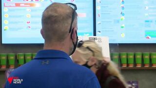 Vaccine passports for overseas travel to be available for Australians from next month I SBS News